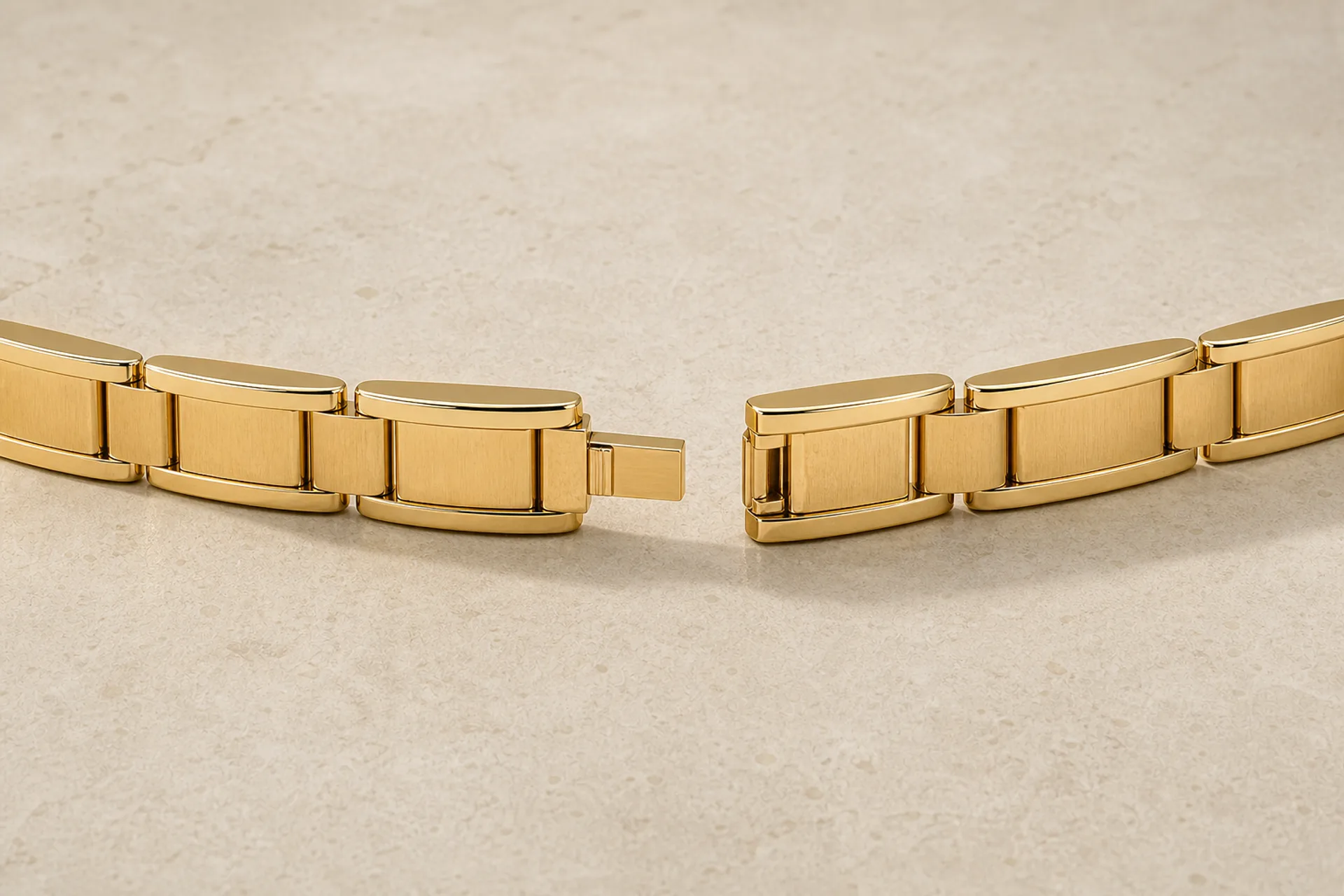 Open concealed clasp aligned between bracelet links