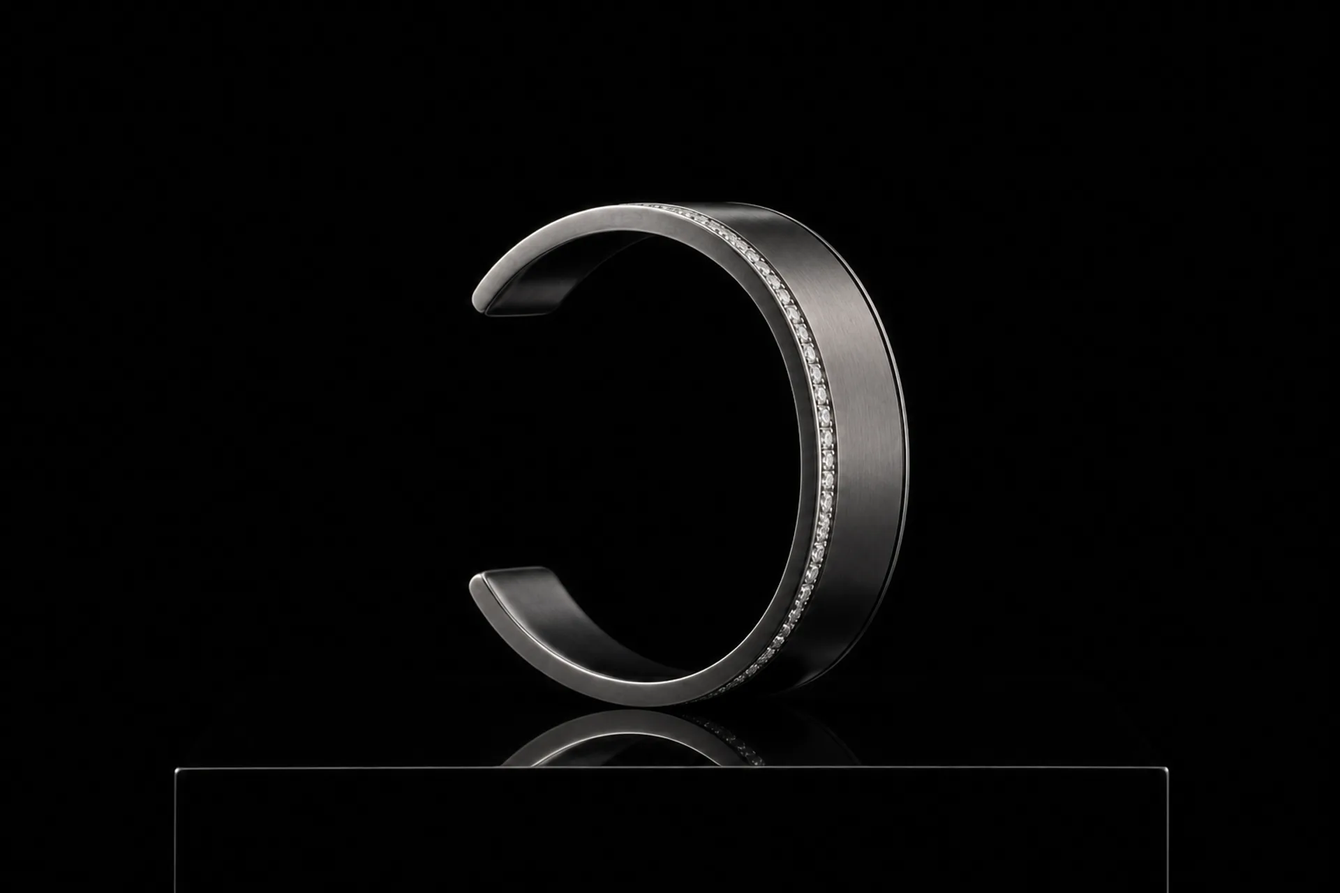 Profile of the blackened-platinum cuff showing its wall thickness
