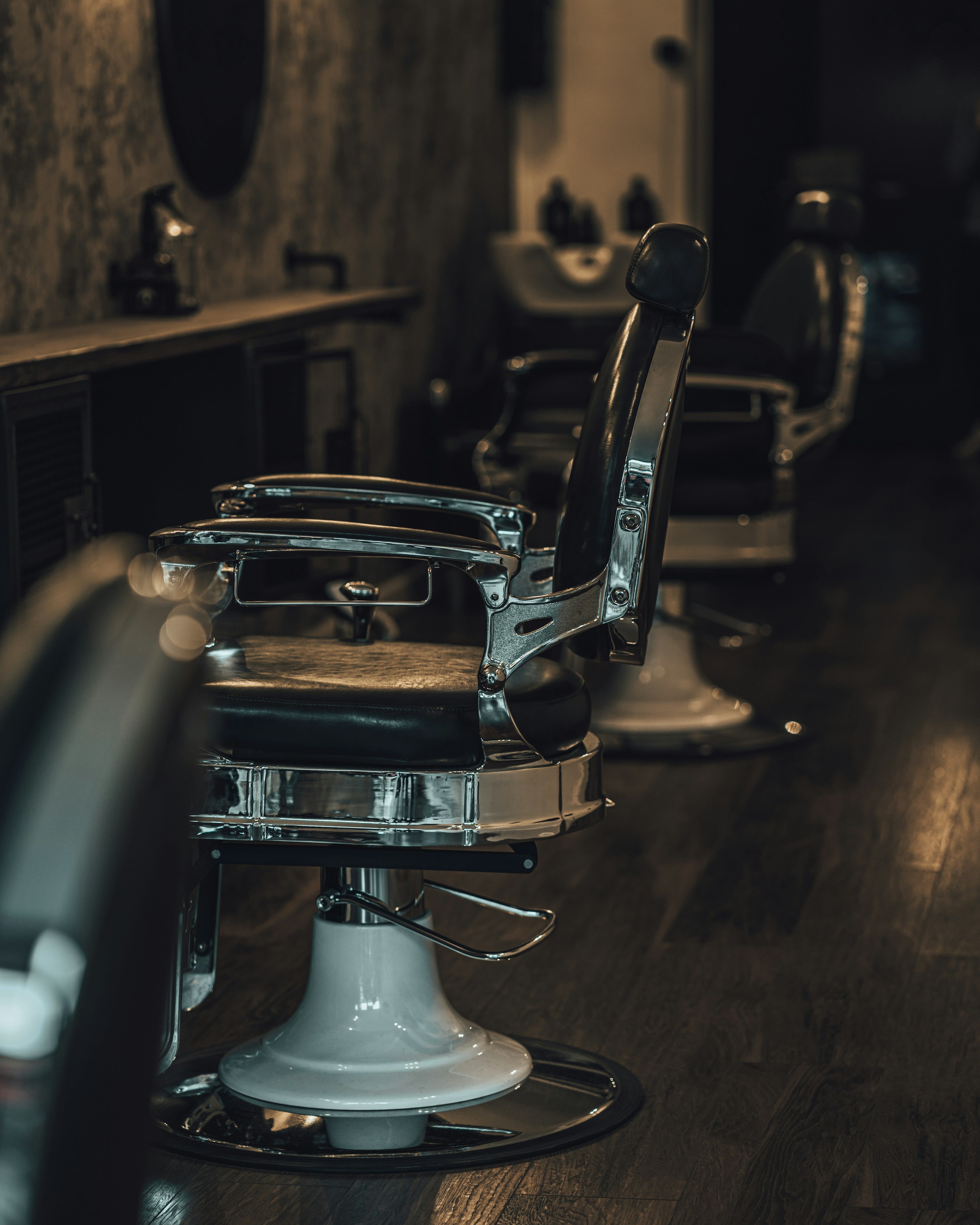 Black and silver barber chair in a barbershop